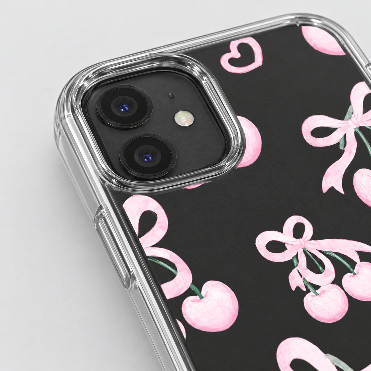 Cherry Tied clear iPhone case, close-up detail